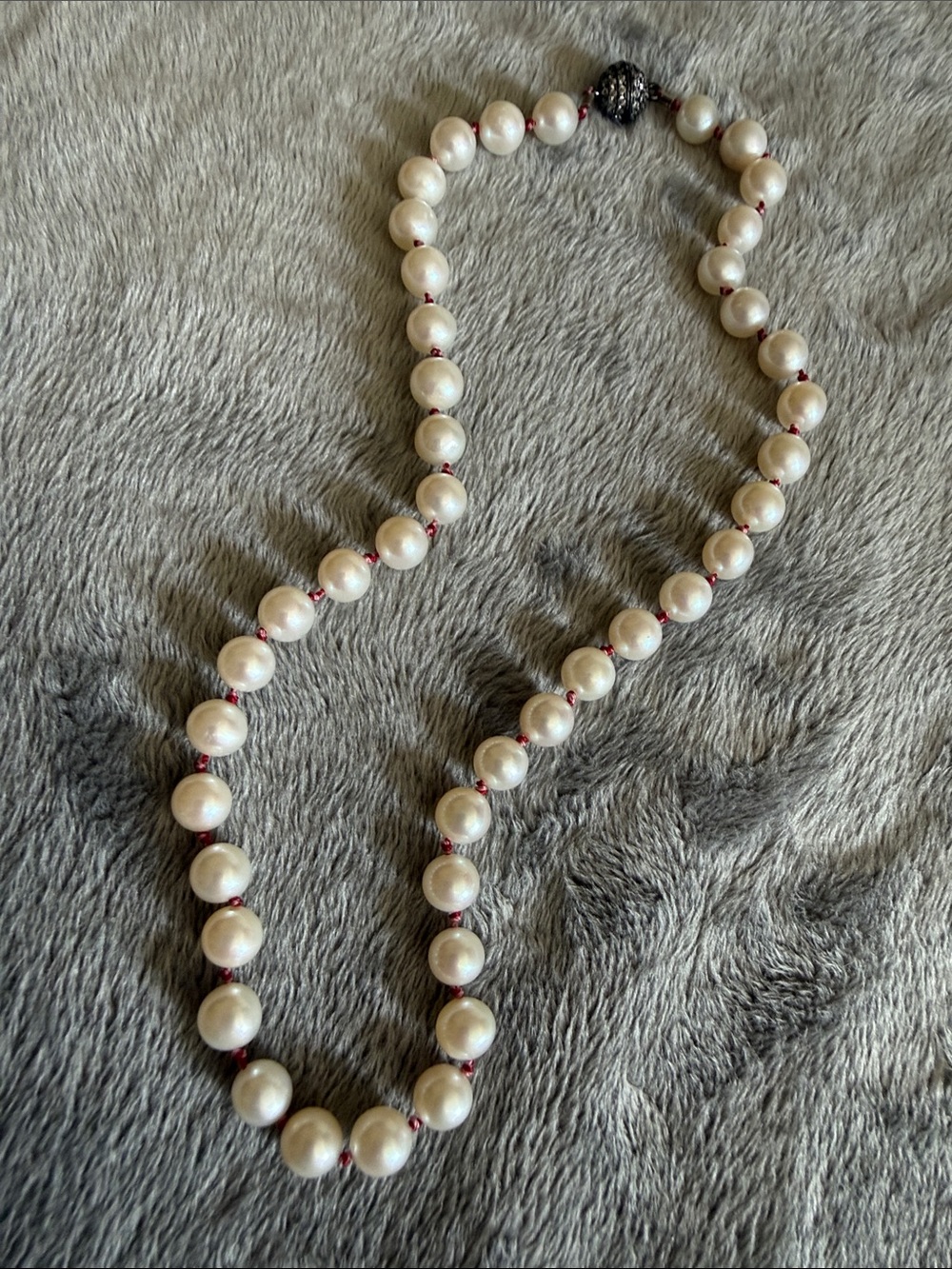 Hand knotted freshwater pearls using two nylon threads. Magnetic clasp. 15 inche